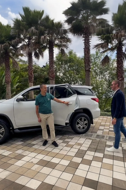 Bilingual driver picking up an international patient — Colombia Care Dental, Medellín