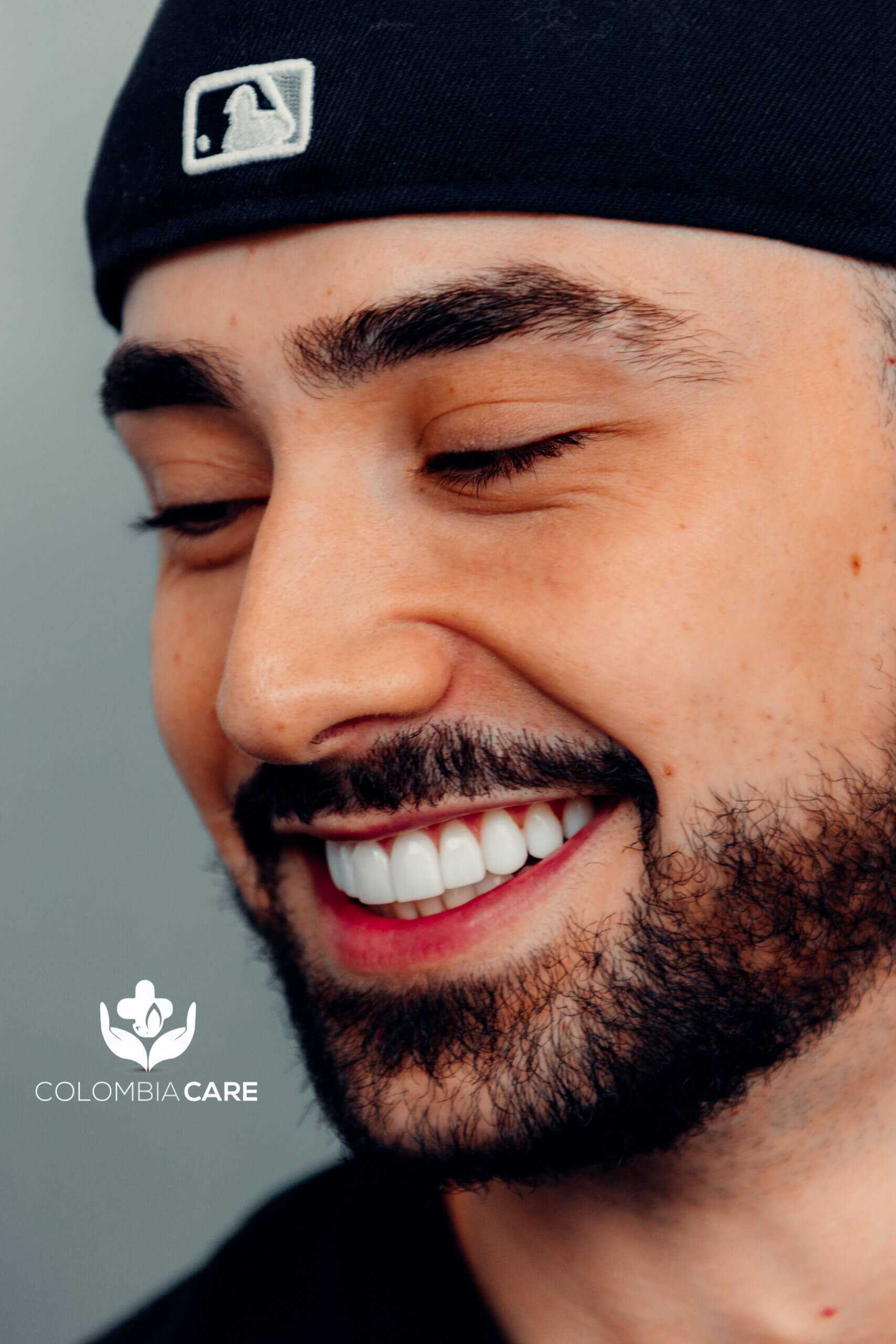 Patient smiling after veneer treatment — Colombia Care Dental, Medellín